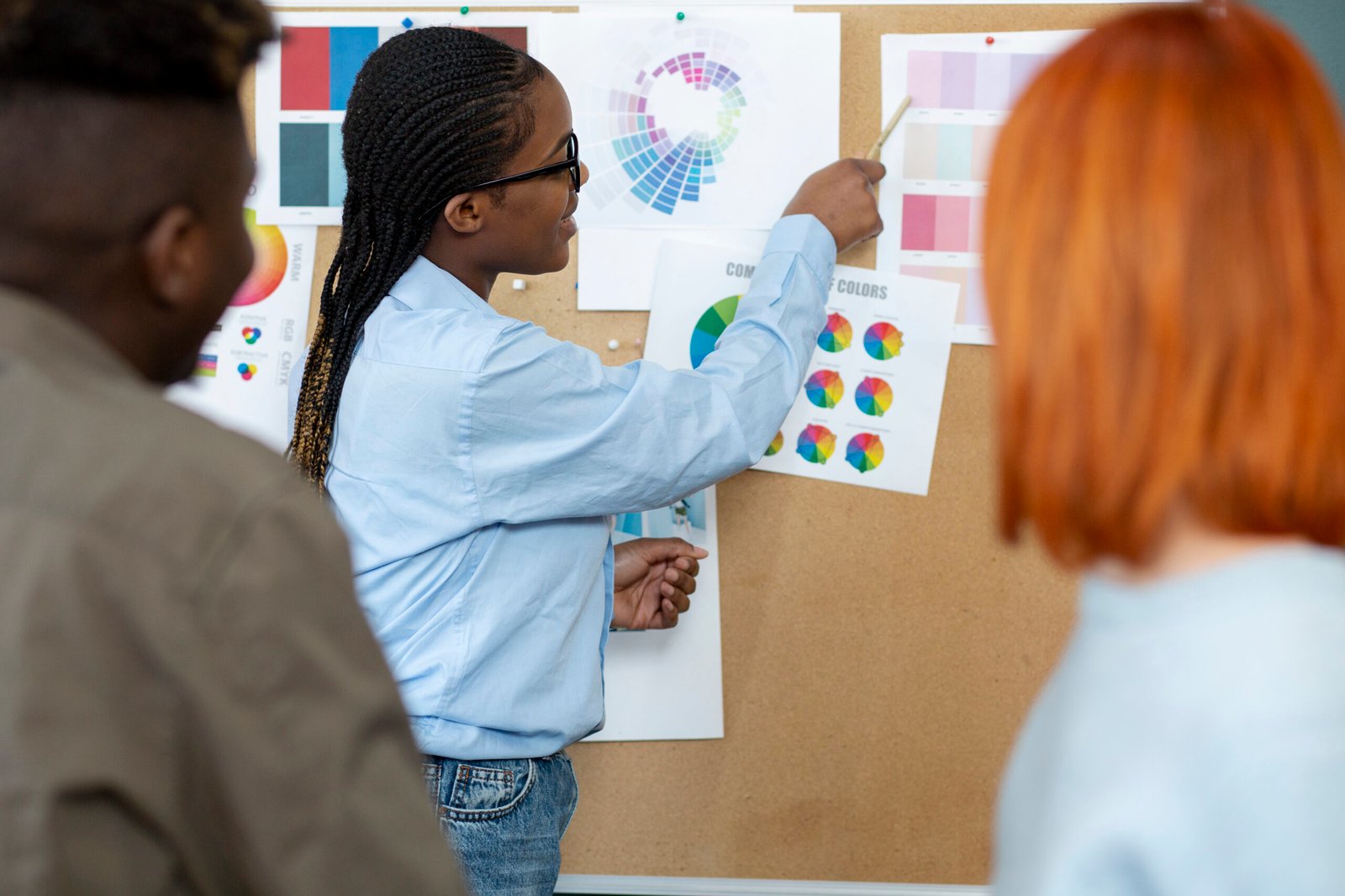 workers assisting business meeting